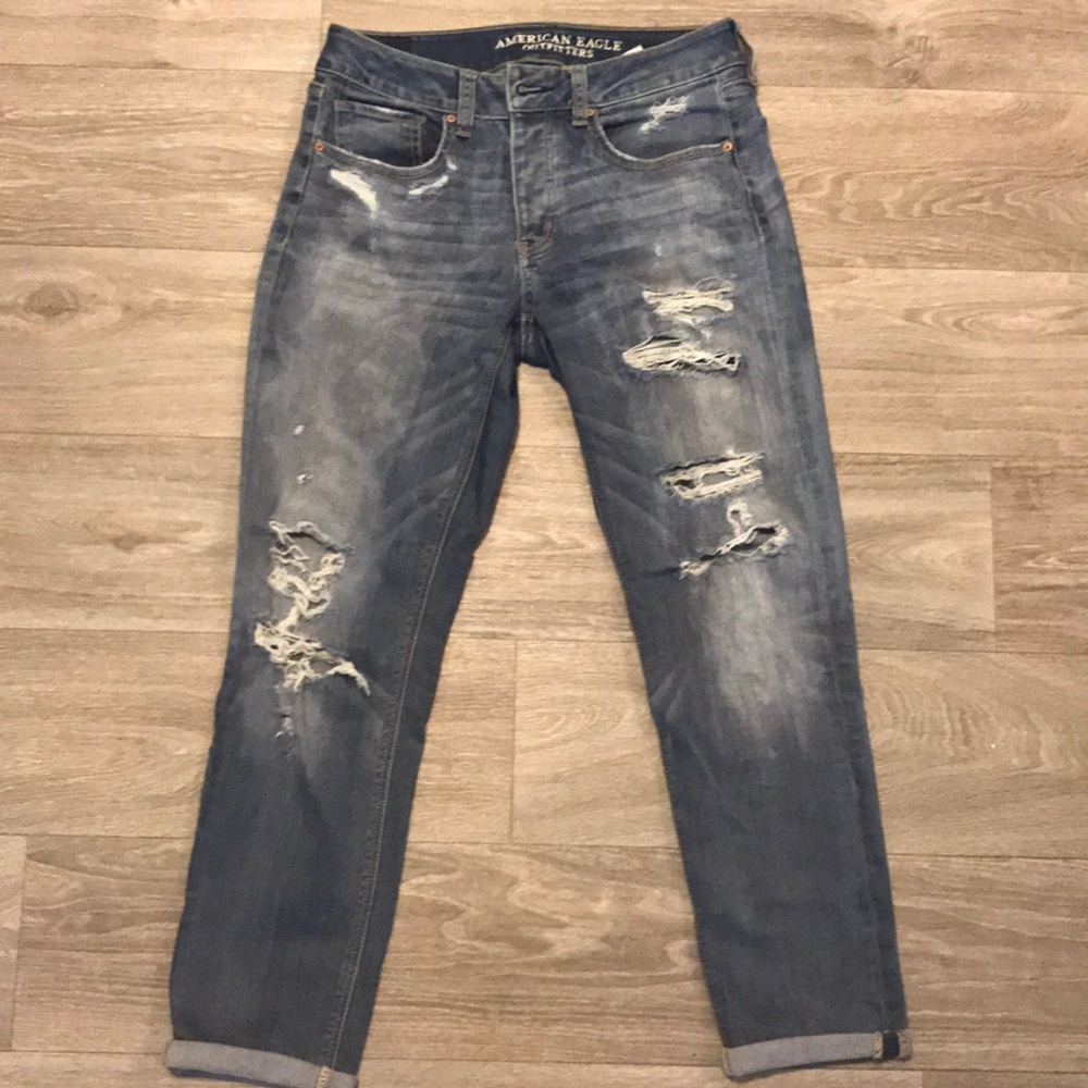 distressed tomgirl jeans
